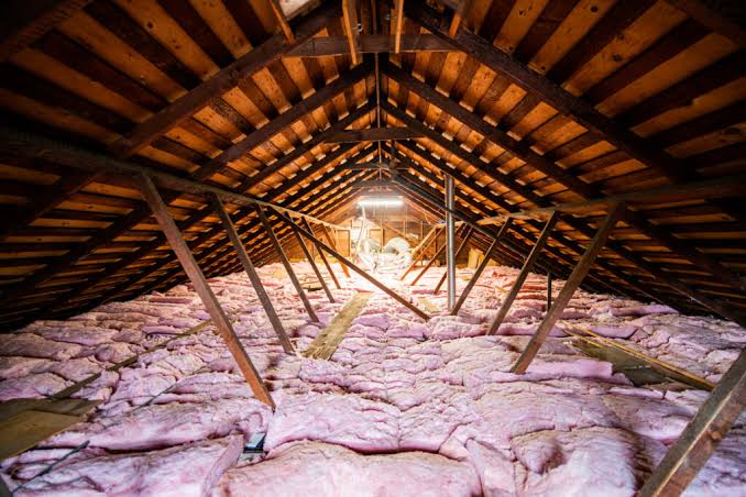 Attic insulation between the roof rafters and joists of a Raleigh, NC home